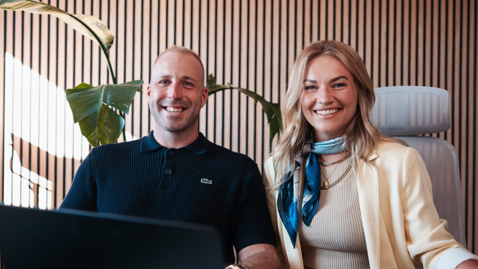 Daniel and Lily in their office